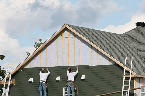 Professional Siding Installation technician working in Lakewood, NY